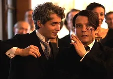 Critic Lucien Beaumont (Sylvain Dieuaide) Dadaist Kyrill Von Priest (Aubert Fenoy)